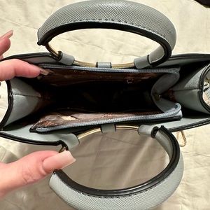 Dusty blue handbag with strap